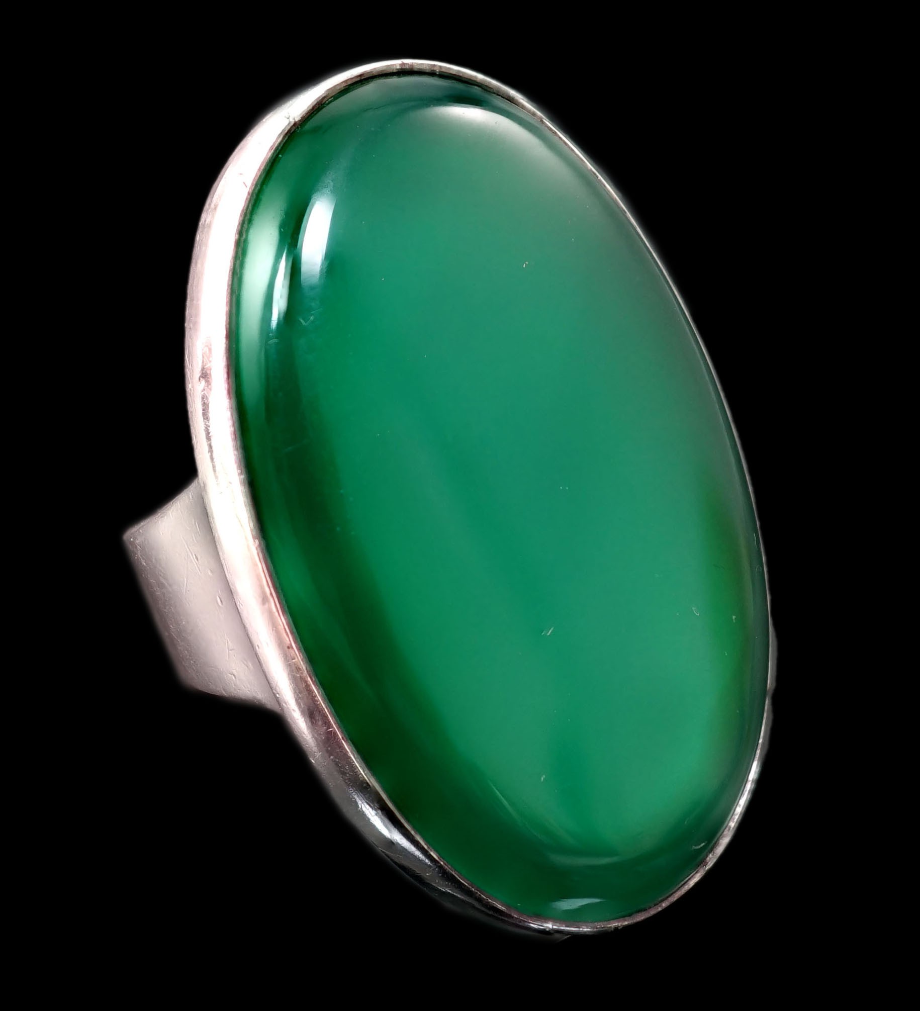 A Georg Jensen sterling 925 and oval chrysoprase set dress ring, numbered 90A, size K/L, gross weight 13.7 grams.